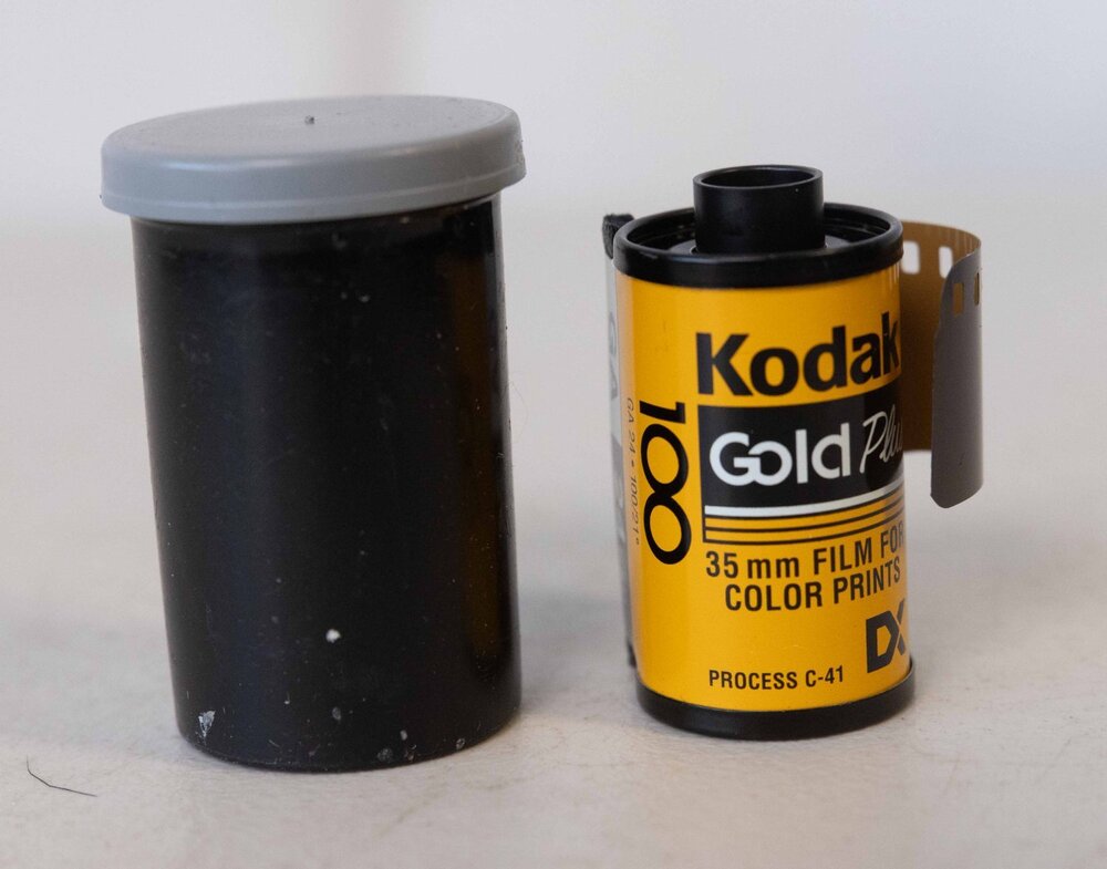 Kodak Gold Plus 100 35mm color print film roll yellow black gray 1990s